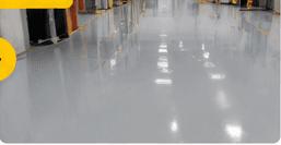 Piso industrial depois da aplicação do revestimento epóxi